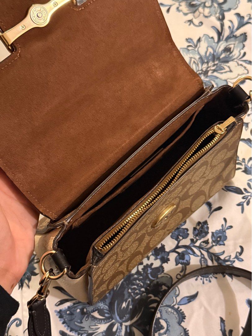 Coach Morgan Top Handle Satchel (Category: Luxury Bags & Wallets) located in Manila. Submitted by rocco_ (Listing ID 1416611555, Image 3). Description: Coach handbag with signature pattern, top handle, and detachable strap. Features brown leather and gold-tone clasp. No issues, worn once or twice only. Dimensions: Length: 4.25" Height: 8.25" Width: 6.25".