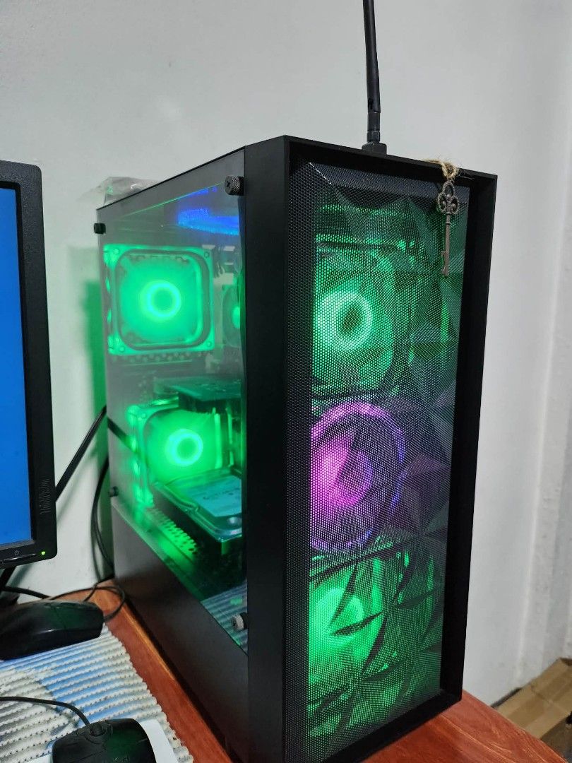 CPU Only AMD A10 (Category: Desktops) located in Caloocan City. Submitted by altder (Listing ID 1416437883, Image 1). Description: CPU only AMD A10 8 gig DDR3 Storage: 500 gig with Video card can Play Valorant Issue: Bluescreen - Features vibrant RGB fans - Tempered glass side panel - Sleek black case design - Multiple fans for optimal cooling - Visible internal components.