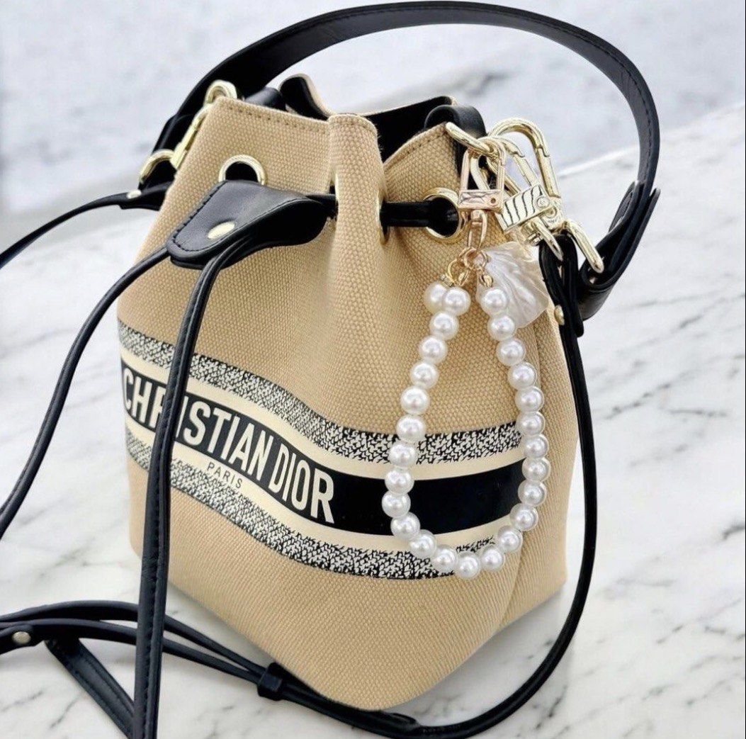 Dior Bucket GWP vip gift bag (Category: Luxury Bags & Wallets) located in Manila. Submitted by urbantrendsetter (Listing ID 1416610023, Image 1). Description: Dior bucket vip gift comes with box and 3 straps (pearl, short and long) hand bag, sling and shoulder bag .