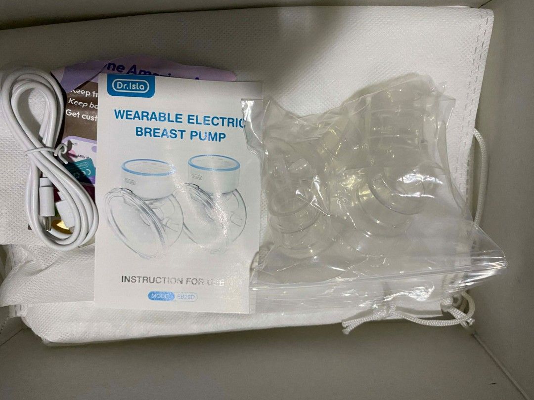 Dr. Isla Wearable Breast Pump (Category: Breastfeeding & Bottle Feeding) located in Lingayen. Submitted by atarico (Listing ID 1416434252, Image 2). Description: only used twice, complete set, no issue/damage.