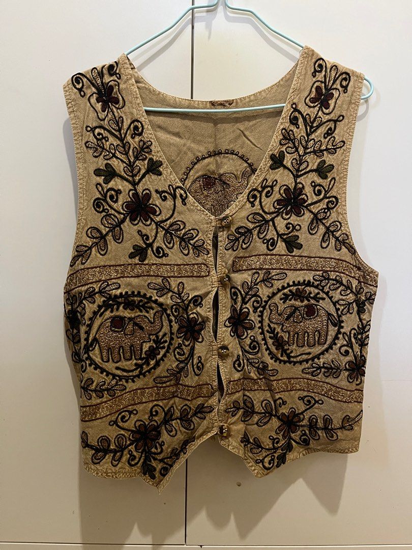 Embroidered khaki Elephant Vest (Category: Others Tops) located in Nabua. Submitted by twelvet (Listing ID 1416641176, Image 1). Description: - Intricate elephant and floral embroidery - V-neck design - Button closures - Tie-back detail - M to L VERY CUTESY.