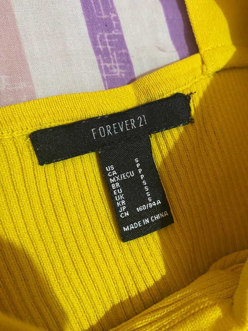 Forever 21 Yellow Sleeveless Top (Category: Sleeveless) located in Manila. Submitted by rmdln (Listing ID 1416515776, Image 2). Description: .