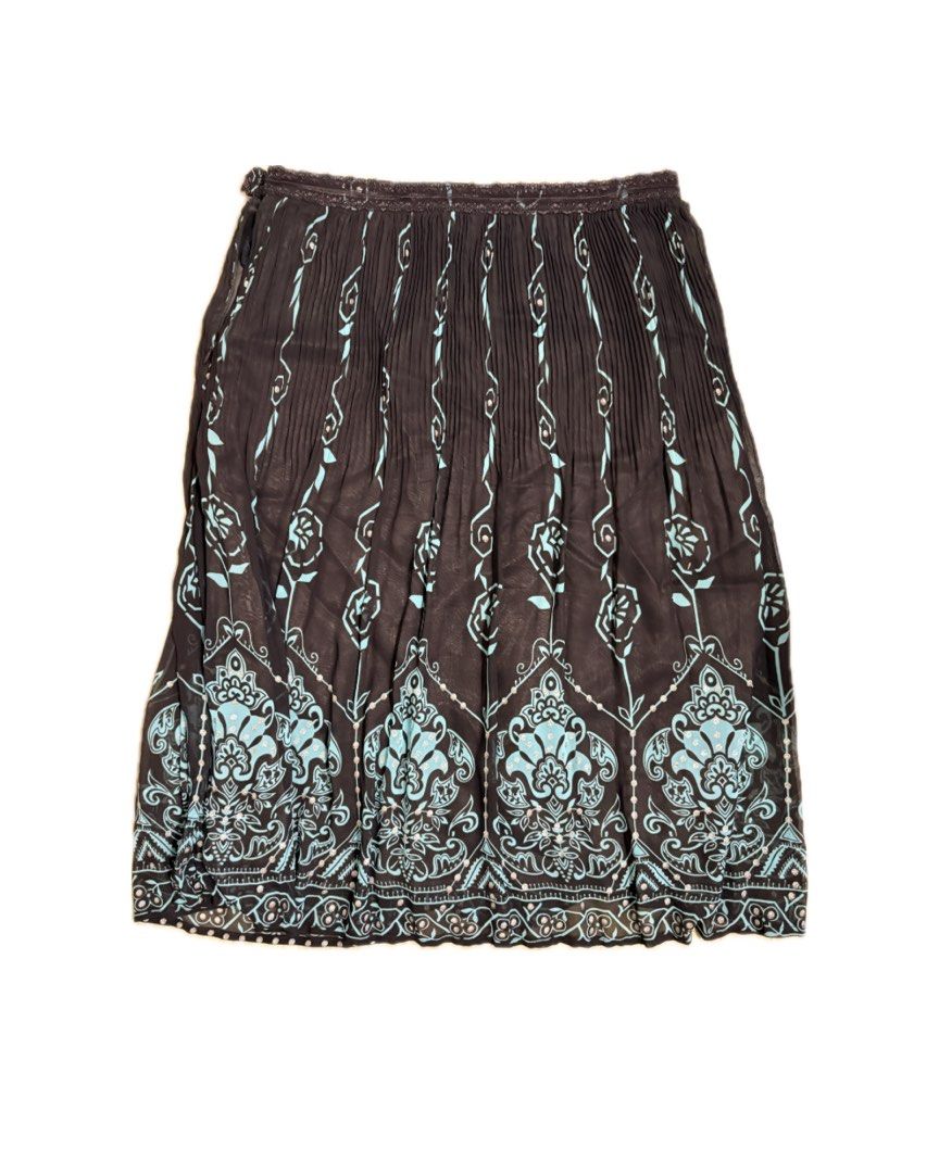 [FREE SF] Brown Pattern Midi Skirt (Category: Skirts) located in Manila. Submitted by j_decluttering (Listing ID 1416571361, Image 1). Description: - lightweighy flowy fabric - has lining inside - fits XS-S - free sf via jnt!.