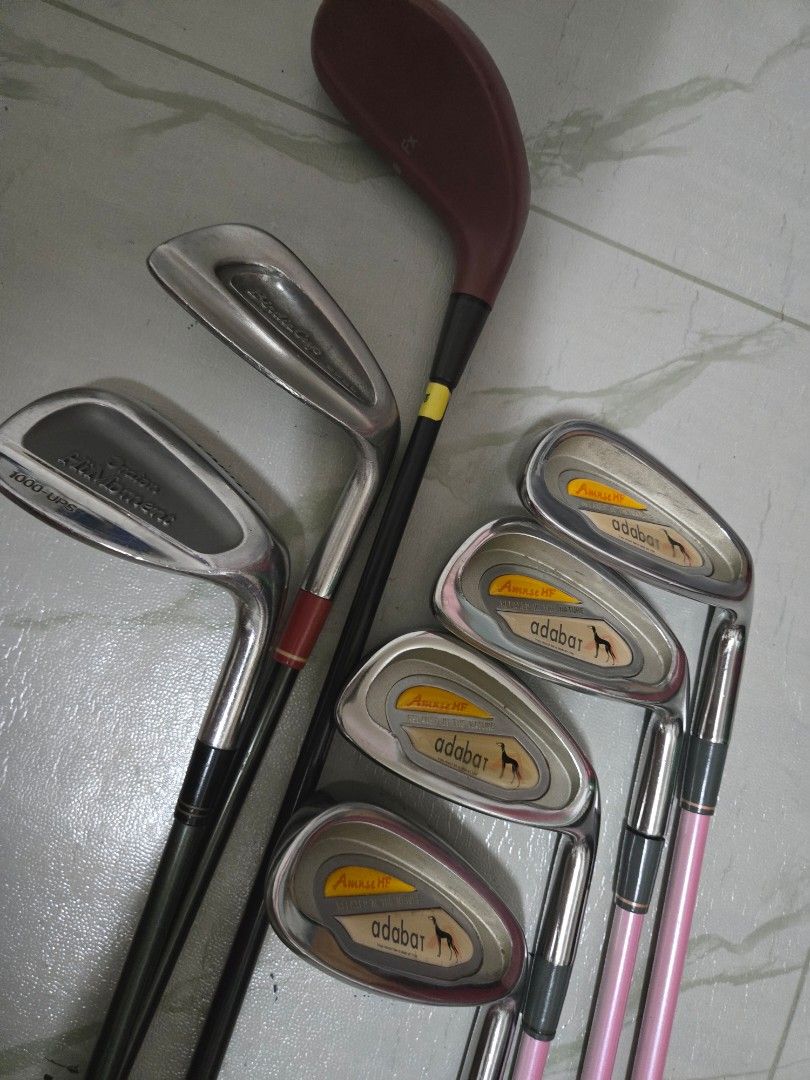 Golf Club Set (Category: Golf) located in Manila. Submitted by mikaelaacosta (Listing ID 1416584933, Image 3). Description: Golf club ladies Choose iron set (steel or graphite) Choose a driver Free range bag Steel shaft Mizuno johnny miller iron (8pcs) -p,3-9 Mizuno - 3w Japanese intl -sw Or Graphite Adabat iron pink (4pvs) - sw,5,7,9 Daiwa - dw Maruman - pw Int est - 2 --- Choose driver Ping or honma Used callaway range bag green Pick up - boni 