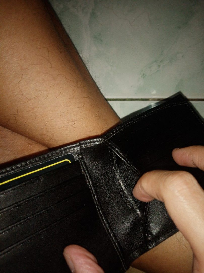 Gucci Black Leather Wallet (Category: Luxury Bags & Wallets) located in Marikina City. Submitted by rjhay251210 (Listing ID 1416564709, Image 2). Description: - Authentic Gucci wallet - Black leather exterior - Embossed Gucci logo - Multiple card slots - Bill compartment - Black leather interior with Gucci logo - Comes with original Gucci box.