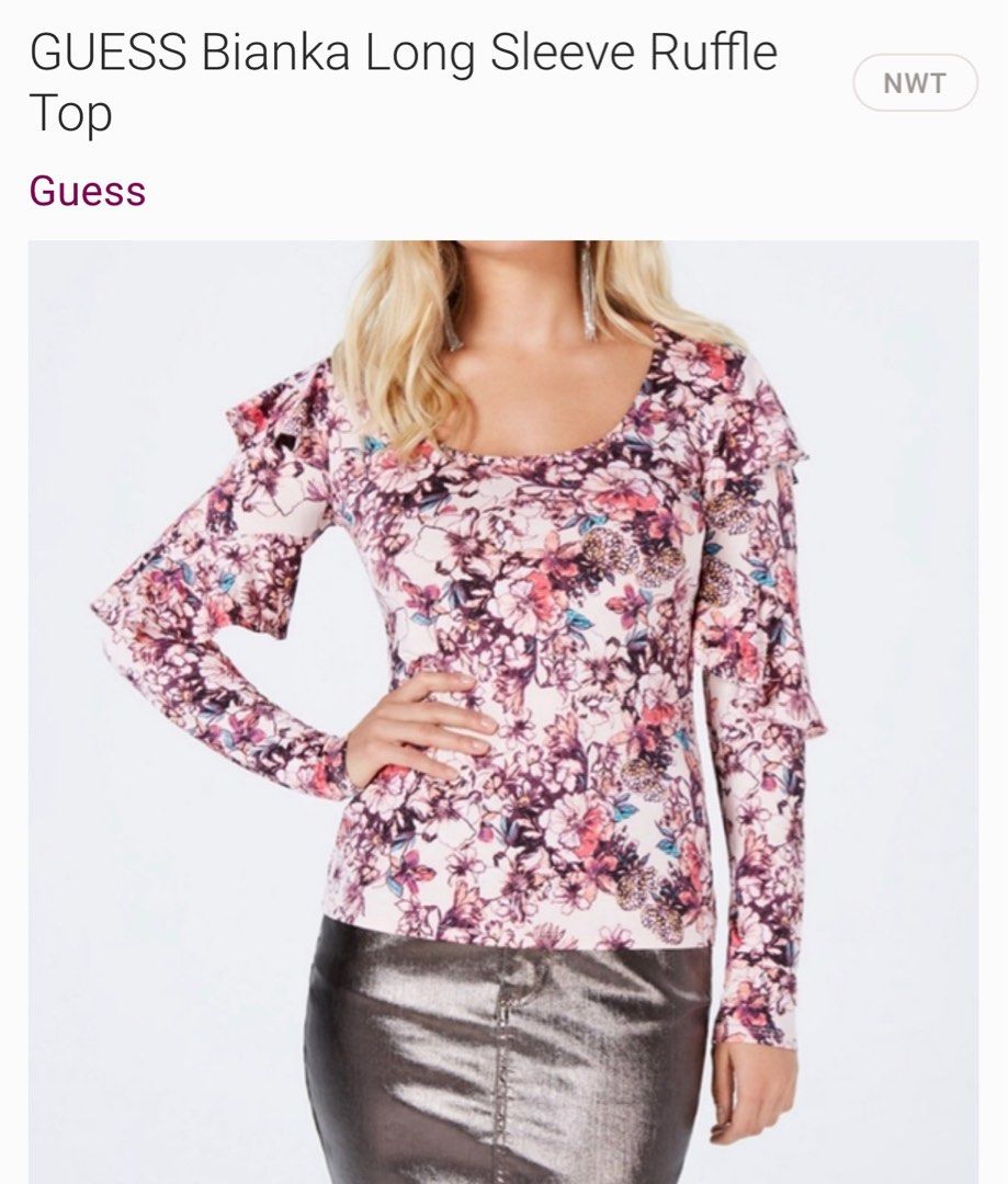 GUESS Bianka Long Sleeve Ruffle Top (Category: Blouses) located in Paranaque City. Submitted by iluvcongee (Listing ID 1416534360, Image 1). Description: BNWT Color: Hyper Bloom Print Rose Dust Hits at hip Scoop neckline Long sleeves with ruffled detailing throughout 98% Polyester/ 12% Spandex Hand wash.