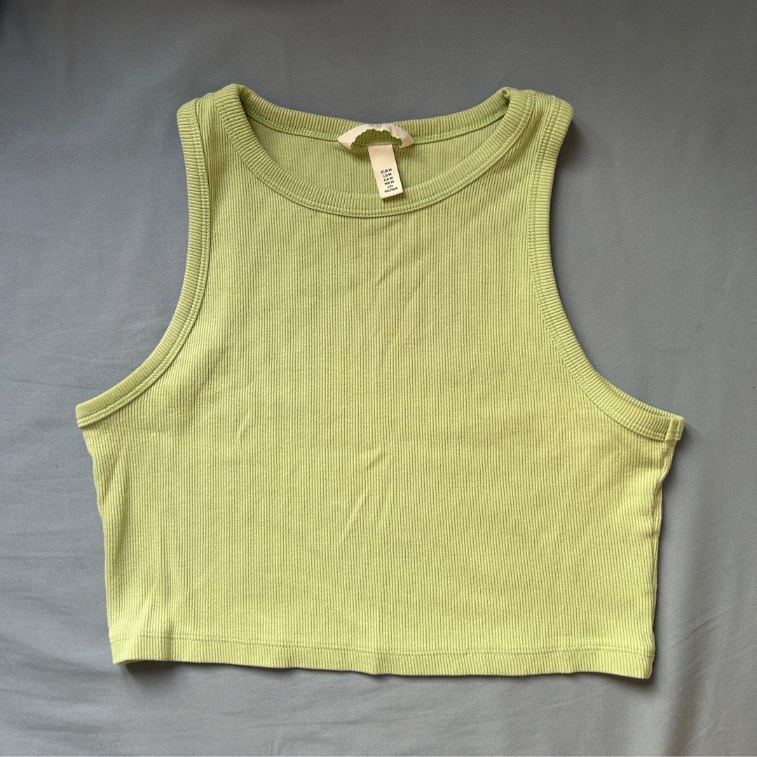 H&M Ribbed Crop Tank Top (Category: Sleeveless) located in Quezon City. Submitted by whalien. (Listing ID 1416541312, Image 1). Description: - H&M tank top - Ribbed texture - Cropped design - Light green color - Round neckline - Sleeveless - Casual.