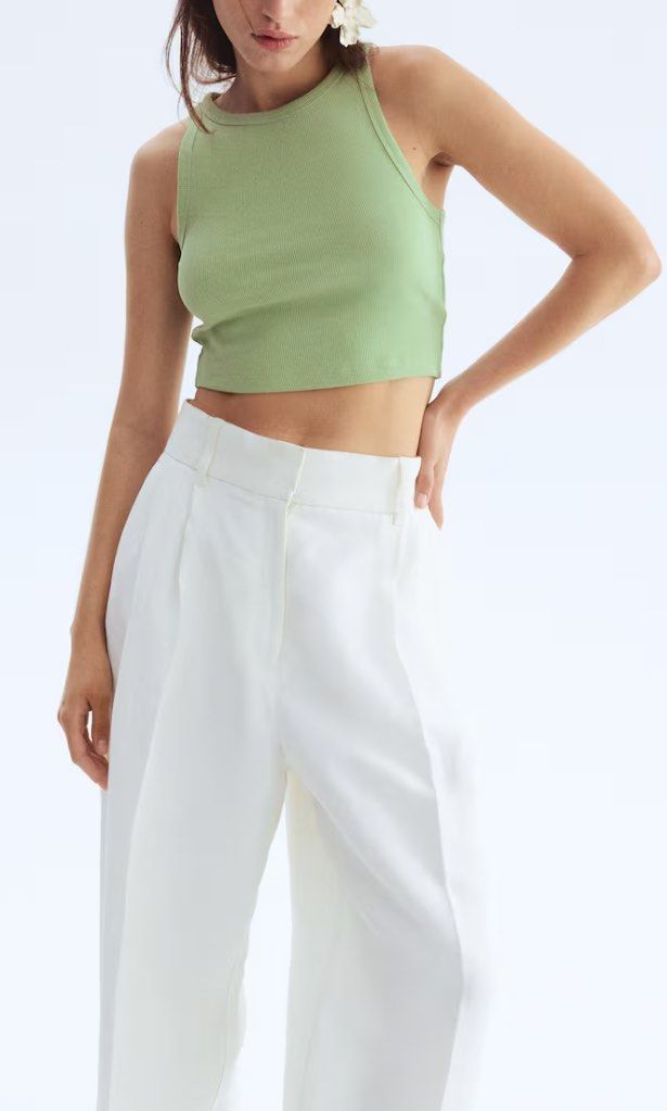 H&M Ribbed Crop Tank Top (Category: Sleeveless) located in Quezon City. Submitted by whalien. (Listing ID 1416541312, Image 3). Description: - H&M tank top - Ribbed texture - Cropped design - Light green color - Round neckline - Sleeveless - Casual.
