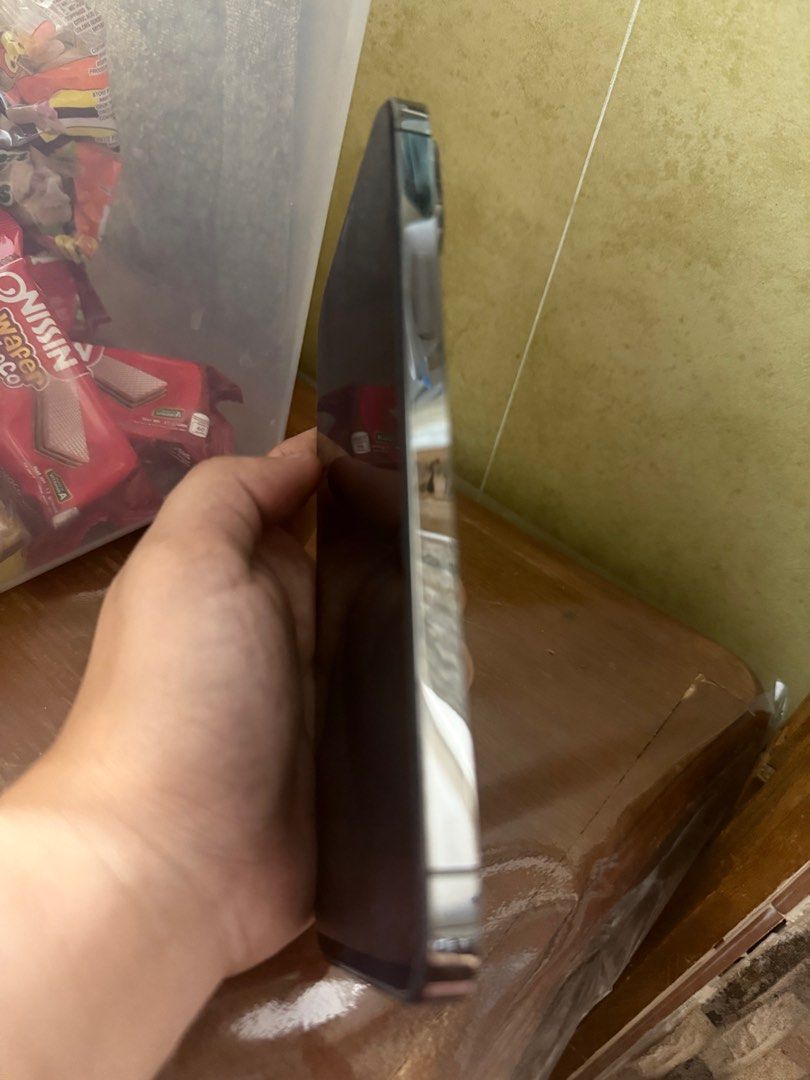 iPhone 12 Pro Max 256gb (Category: iPhone 12 Series) located in Manila. Submitted by riaaaloves (Listing ID 1416607965, Image 2). Description: Smart locked 86% BH Color : graphite PM for other inclusions .