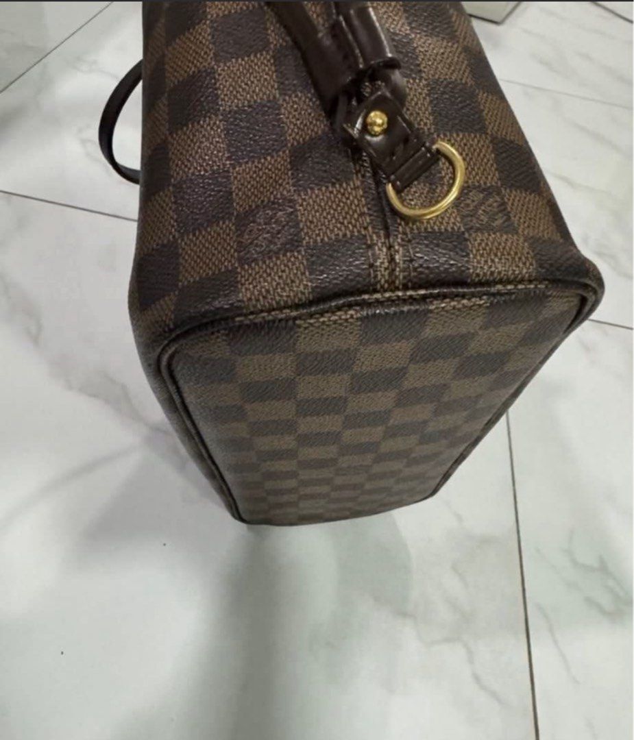 Louis Vuitton Damier Ebene Neverfull PM (Category: Luxury Bags & Wallets) located in Manila. Submitted by decluterthings888 (Listing ID 1416620890, Image 3). Description: - Authentic Louis Vuitton Neverfull pm - Damier Ebene canvas - Brown leather handles and trim - Gold-tone hardware - Spacious interior - Adjustable side laces - Stylish everyday tote.