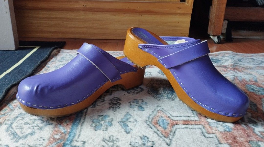 Maja Wood Open Back Leather Clogs in Purple (Category: Heels) located in Baguio. Submitted by katgon2016 (Listing ID 1416580998, Image 3). Description: The Maja Wooden Clog sticks to its roots by encompassing the classic BJORK Swedish clog that we know today. Genuine leather upper on a classic wooden outsole. Hand-Made in Europe Leather upper Genuine Wood Outsole harvested from sustainable European forests,... no signs of use but has mild wrinkli
