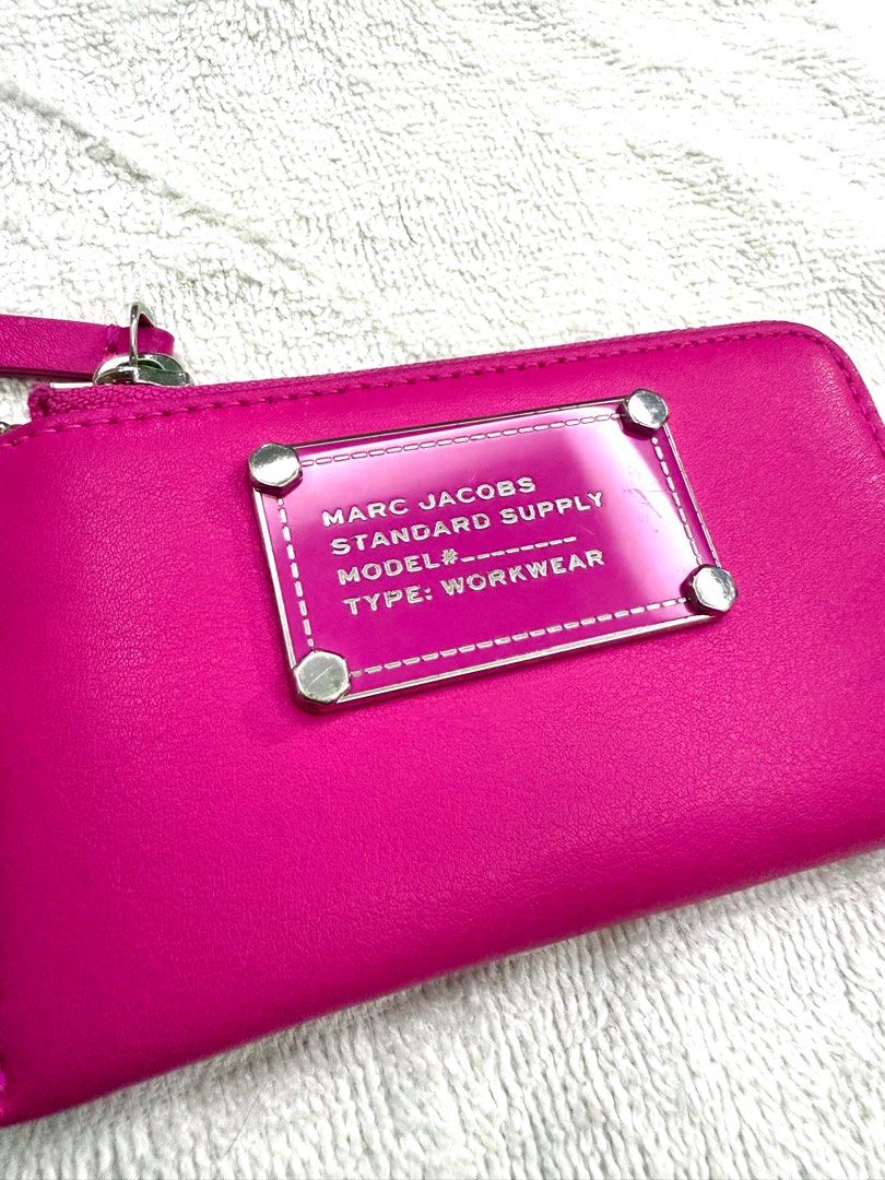 Hot pink Marc Jacobs Standard Supply Card Case (Category: Luxury Bags & Wallets) located in Tanza. Submitted by awesomeshopper (Listing ID 1416608501, Image 1). Description: Used a couple of times. bought from US . Fuchsia in color. 6 card slots in total. RFS: Need fund.
