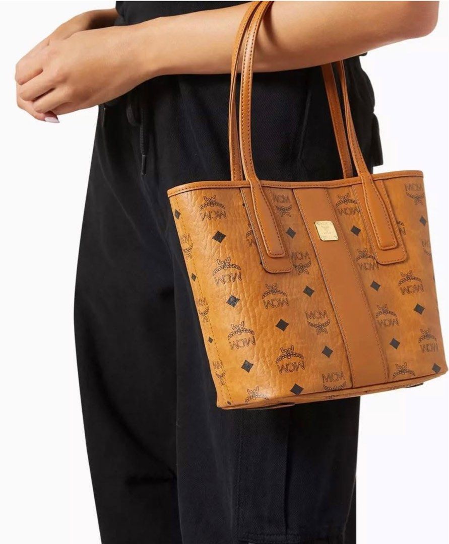 Mcm mini liz (Category: Luxury Bags & Wallets) located in Cainta. Submitted by temang.ukay (Listing ID 1416529334, Image 3). Description: Mcm mini Iz Leather top handles Reversible design Good as new Bag only No other inclusions Location Cainta Rizal .