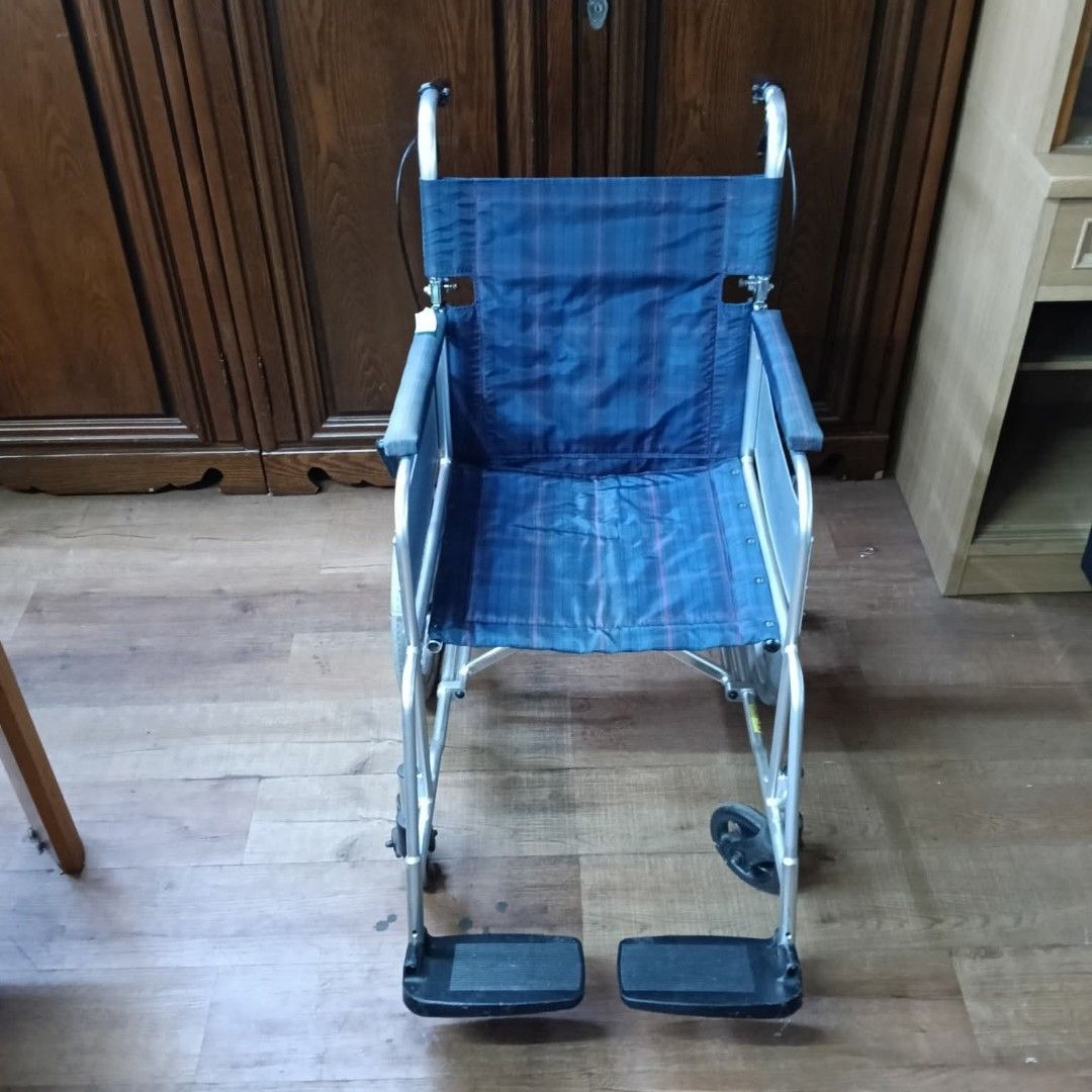 2nd hand MIKI Wheelchair (Category: Wheelchairs) located in Paranaque City. Submitted by 2ndcharmfurniture (Listing ID 1416525160, Image 2). Description: MIKI wheelchair features a blue seat and backrest. It has dimensions of L80*W50*H41-85cm, with a seat height of 41cm. The wheelchair has footrests and armrests..