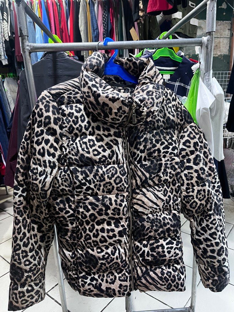 Miss Leopard Print Puffer Jacket XL (Category: Coats, Jackets and Outerwear) located in Baguio. Submitted by lattethrift21 (Listing ID 1416535137, Image 1). Description: - Stylish leopard print puffer jacket - Size: XL Dimes 24 x 17 - Features a high collar and full-length zipper - Lining: Black - Material: 100% polyester - Condition: excellent.