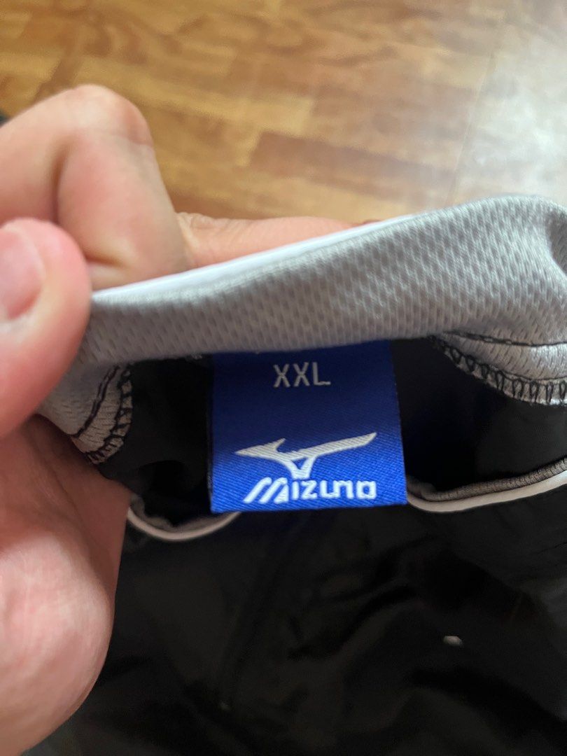 Mizuno Batting Shirt (Category: Coats, Jackets and Outerwear) located in Quezon City. Submitted by chris.secondhand (Listing ID 1416578429, Image 2). Description: - Mizuno jacket - Color: Black and gray - Size: XXL - Features: Half-zip, short sleeves - Design: Sporty with gray panels, Mizuno logo on chest -.