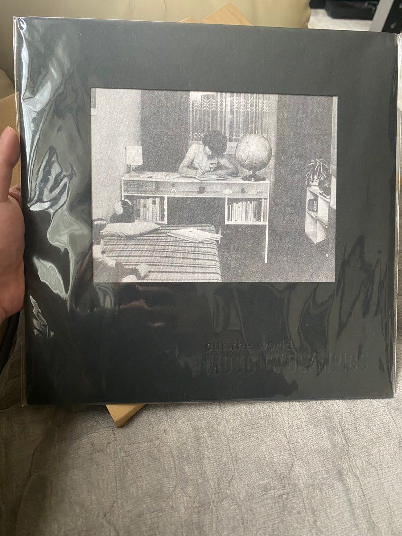 Moscow Olympics - Cut The World Vinyl (Signed) (Category: Vinyls) located in Quezon City. Submitted by turpentinechaser (Listing ID 1416634066, Image 1). Description: Brand new. Super rare record. Signed by Richard Olaguera (drums, guitar).