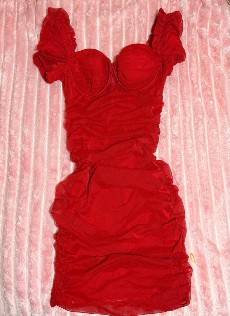 Oh Polly Red Ruched Mini Dress (Category: Dresses) located in Manila. Submitted by bag_finder (Listing ID 1416500470, Image 3). Description: - Red mini dress - Sweetheart neckline - Ruched detailing - Short, ruffled sleeves - Fitted silhouette - Cutout sides - Gathered skirt - Sheer, lightweight fabric -fits small to medium frame - Decluttering, price is negotiable.