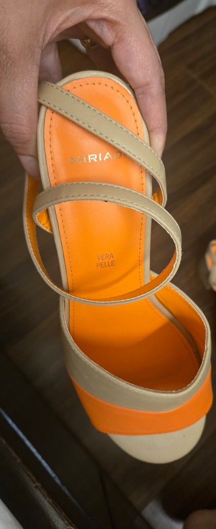 Orange and Beige Sandals (Category: Flats & Sandals) located in Quezon City. Submitted by PreLovedByMrsAL (Listing ID 1416486377, Image 3). Description: - Stylish orange and beige sandals - Features an ankle strap - Comfortable block heel - Textured sole for added grip - Genuine leather material - Brand name detail on insole Miriade is an Italian shoe and bag brand NEVER been used. bought it in it's Milan store.