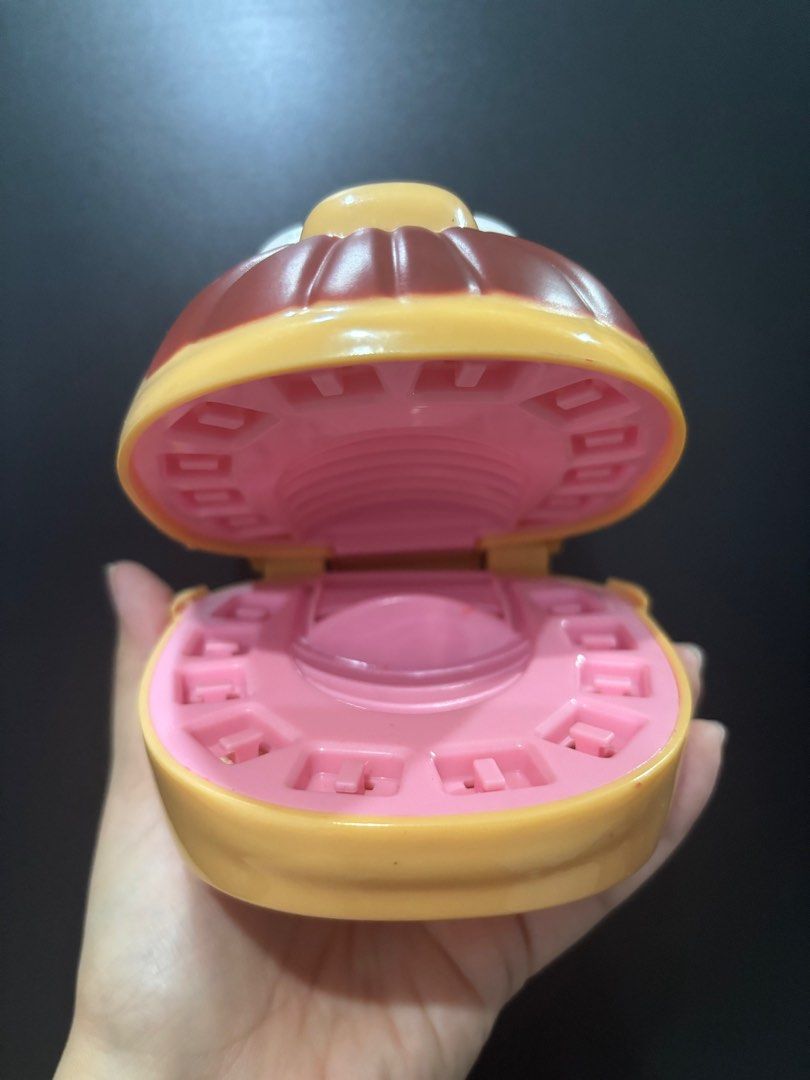 Play-Doh Playset 2 pcs (Category: Kids Toys) located in Manila. Submitted by happyeight (Listing ID 1416501172, Image 2). Description: Play-Doh Playset 1. Play-Doh Dentist Head component - Yellow head with brown mustache and blue eyes. - Opens to reveal a pink interior. - Designed for Play-Doh teeth. - Features shaped holes on the back. - Standalone replacement part. 2. Play-Doh Peppa’s Ice Cream Truck -Features a pink and yellow color scheme - D