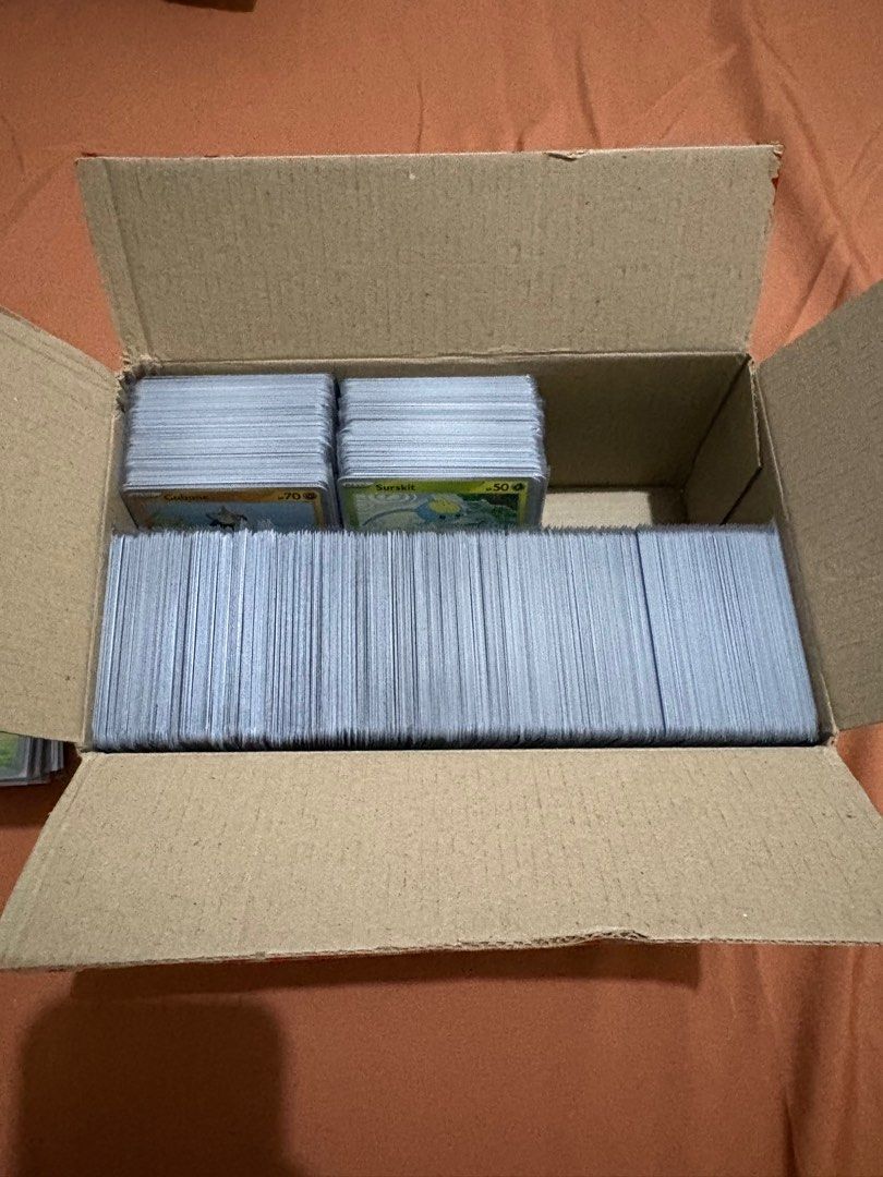 Pokemon Bulk Cards 650+ pcs (Category: Raw Singles) located in Quezon City. Submitted by rlb_main03 (Listing ID 1392509305, Image 3). Description: Original Pokémon Cards Straight from booster packs Quality: Near mint All cards come with a sleeve Selling pokemon cards from my collection Basic - 550+ pcs Holo/Reverse holo - 100+ pcs RFS: decluttering.