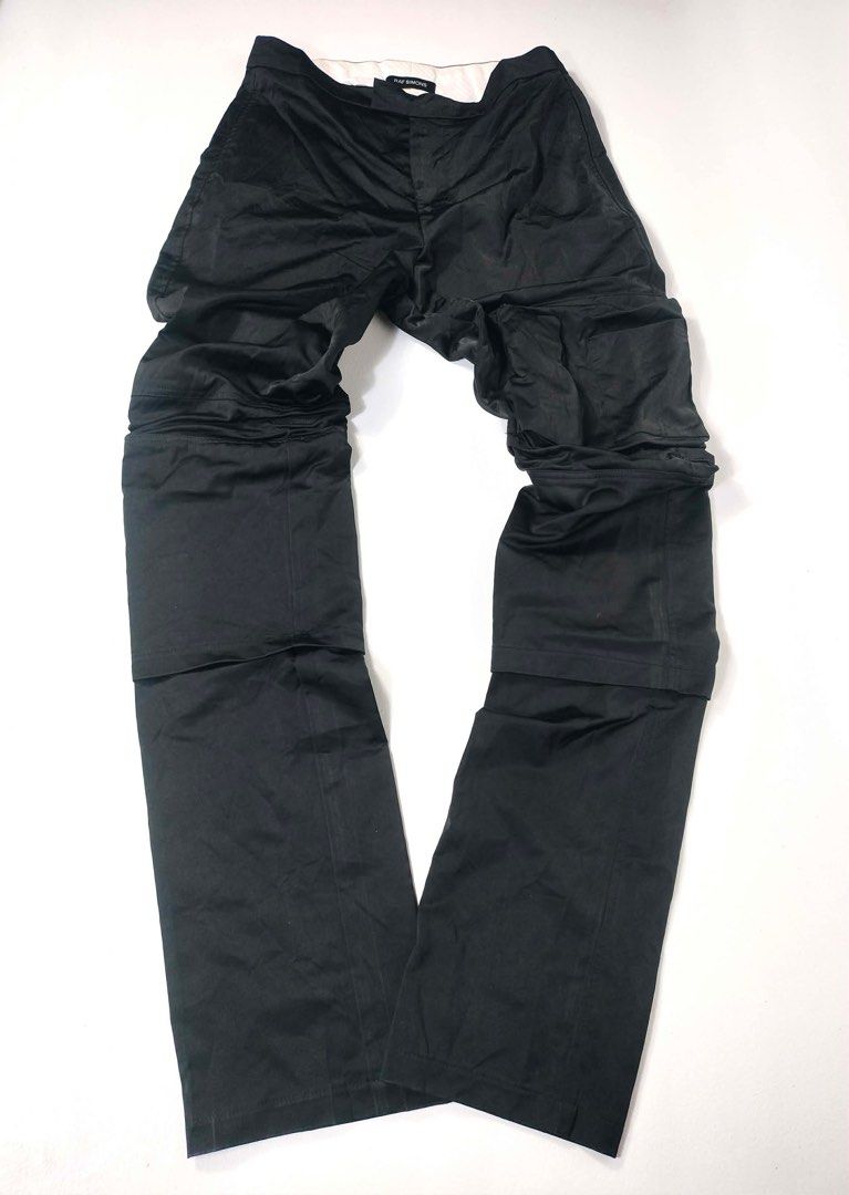 Raf Simons Slim Space Pants with Pockets (Category: Jeans) located in Manila. Submitted by naphthrift (Listing ID 1416636650, Image 2). Description: - Raf Simons Slim Space Pants - Dark navy color - Size 48 - Unique design - Made in Italy - Slim fit - 100% polyester - AW 18/19 collection - Model number: 182-327-30002.