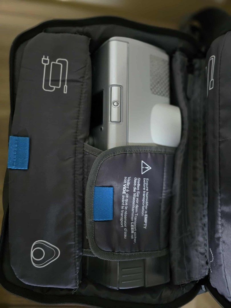 ResMed AirCurve 10 VAUTO CPAP Machine (Category: Medical Supplies & Tools) located in Manila. Submitted by calmdolphin.87b0e4 (Listing ID 1416603291, Image 1). Description: - ResMed AirCurve 10 VAUTO CPAP machine - Includes carrying bag with shoulder strap - Comes with power adapter and all necessary accessories - Features a screen and control knob for easy use - Brand and model clearly visible.