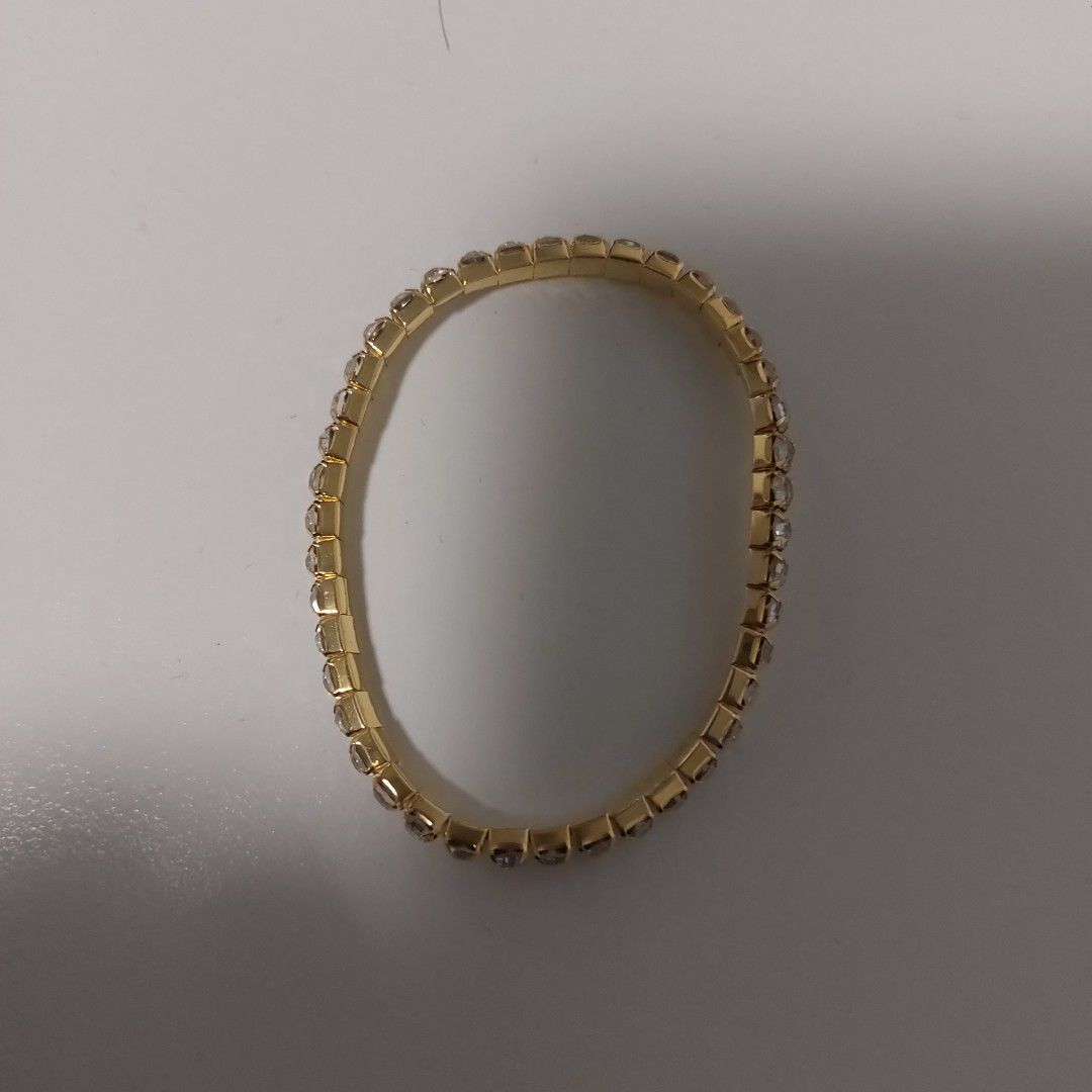 Rhinestone Bracelet (Category: Bracelets) located in Antipolo. Submitted by uncovidspace (Listing ID 1416611278, Image 2). Description: - Rhinestone bracelet - Available in silver and gold - Stretchable design for comfortable fit - Adds glamour to any outfit - Suitable for casual and formal wear.