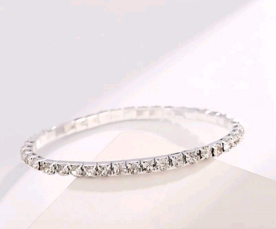Rhinestone Bracelet (Category: Bracelets) located in Antipolo. Submitted by uncovidspace (Listing ID 1416611278, Image 1). Description: - Rhinestone bracelet - Available in silver and gold - Stretchable design for comfortable fit - Adds glamour to any outfit - Suitable for casual and formal wear.