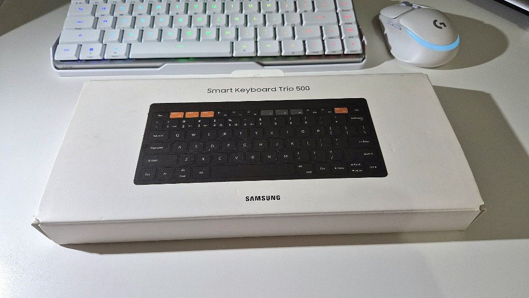 Samsung Smart Keyboard Trio 500 (Category: Computer Keyboard) located in Navotas City. Submitted by hime.ivy (Listing ID 1416454785, Image 1). Description: - Samsung Smart Keyboard Trio 500 - Compact and wireless - Stylish black design with orange accent keys - Includes original packaging RFS: di nagagamit. free sa nabiling samsung phone.