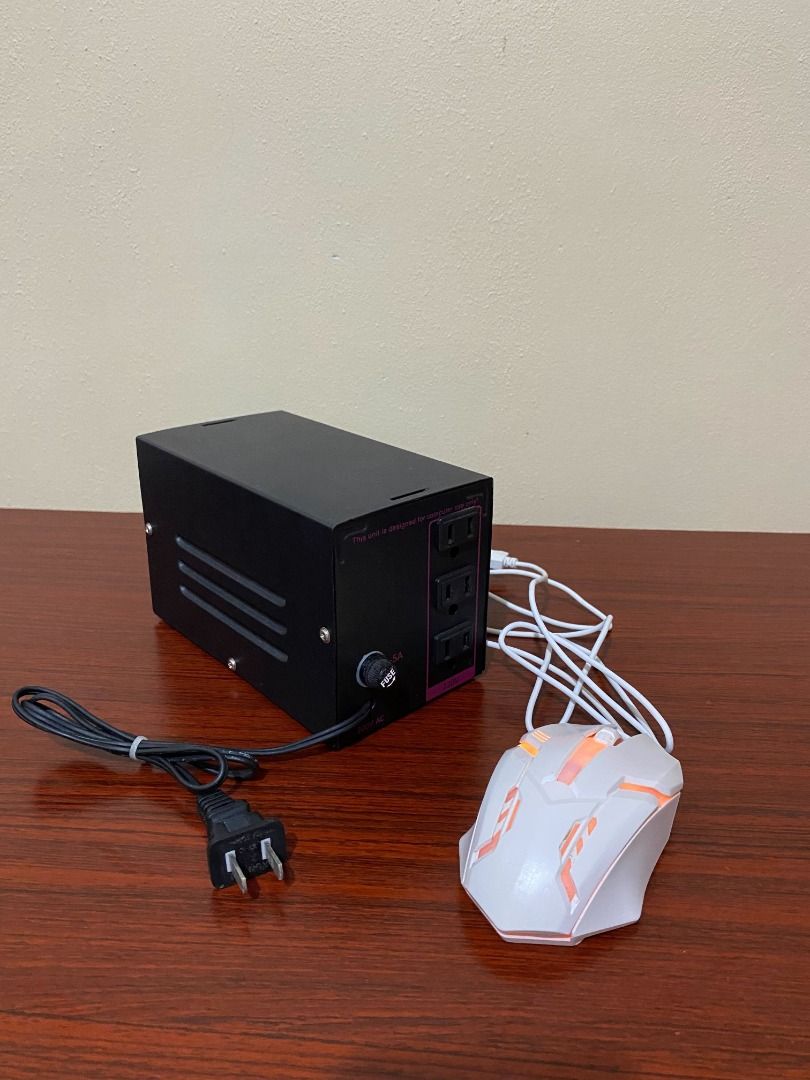 Secure Power Supply with Gaming Mouse (Category: Computer Parts) located in Taguig. Submitted by rudelynamo62091 (Listing ID 1416571499, Image 3). Description: Black power supply unit with 'Secure' logo, on/off switch, and multiple outlets. Includes a gaming mouse with LED. US plug. Tested and working. .