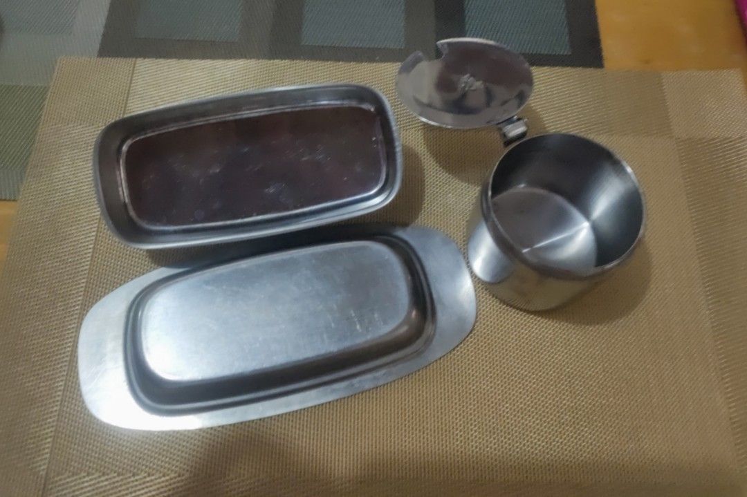 Stainless Steel Kitchen Set (w freebies) (Category: Other Kitchenware & Tableware) located in Imus. Submitted by jane369 (Listing ID 1416586773, Image 3). Description: Vintage Stainless steel kitchen set includes a butter dish with a lid, and a small container with a lid. It is suitable for serving butter, condiments, or other small items. The design is simple and functional, perfect for everyday use. others in the pics are freebies.