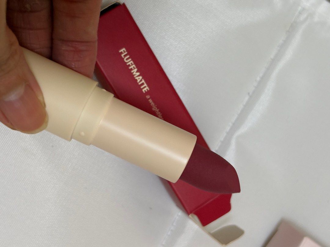 Sunnies Face Fluffmatte Lipstick (Category: Makeup) located in Manila. Submitted by helzn (Listing ID 1416479011, Image 2). Description: - Sunnies Face Fluffmatte Lipstick - Shade: 143 - Finish: Soft Matte - Long-wearing: Up to 8 hours - Lightweight formula - Brand new, in original packaging.