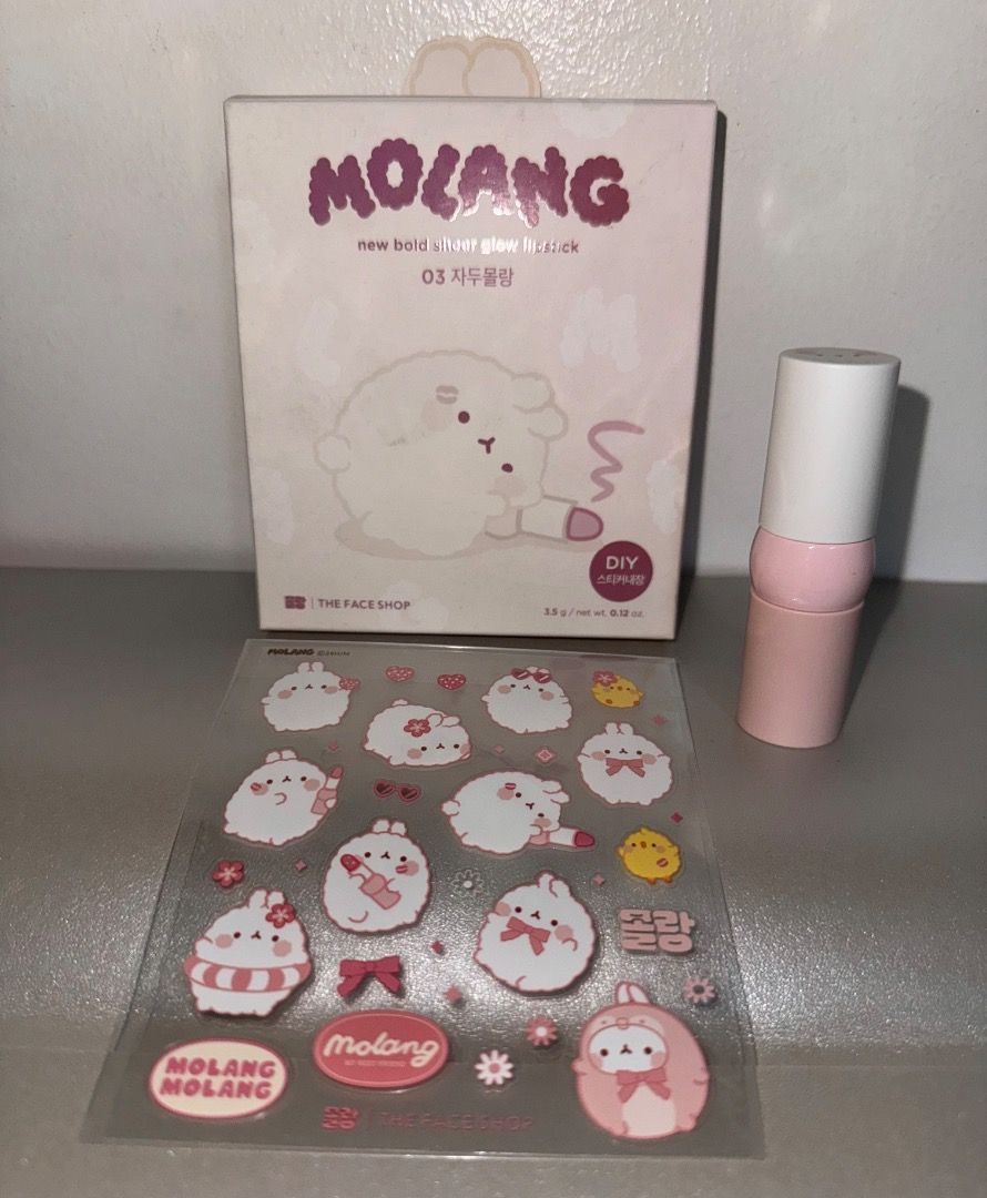 The Face Shop Molang Lipstick (Category: Makeup) located in Quezon City. Submitted by _mt_1234 (Listing ID 1416570003, Image 1). Description: - The Face Shop Molang Sheer Glow Lipstick (3.5g) - Shade: 03 Jadu Molang - Color: Vibrant red - With free stickers .
