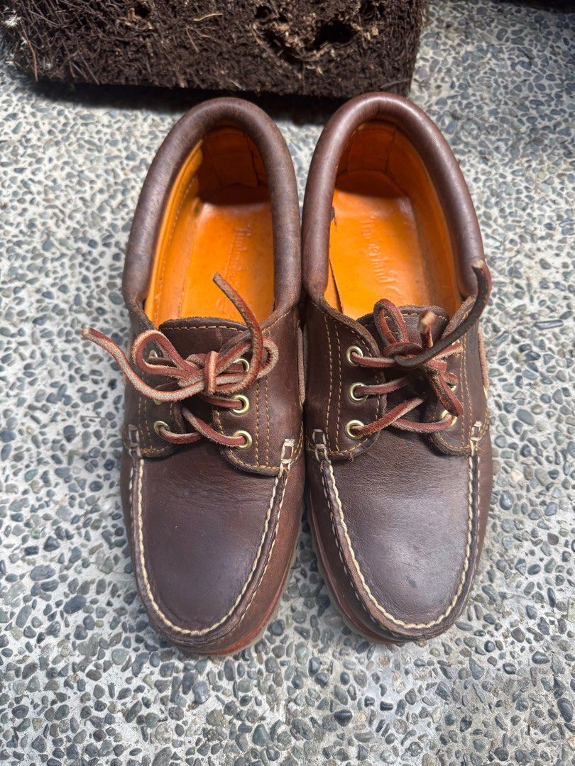 Timberland Boat Shoes - Brown (Category: Loafers) located in Paranaque City. Submitted by heritagemnl (Listing ID 1416457631, Image 3). Description: - Timberland boat shoes - Brown leather - Leather upper - Lace-up closure - Orange lining - Rubber sole with Timberland logo - Signs of wear on leather and soles.