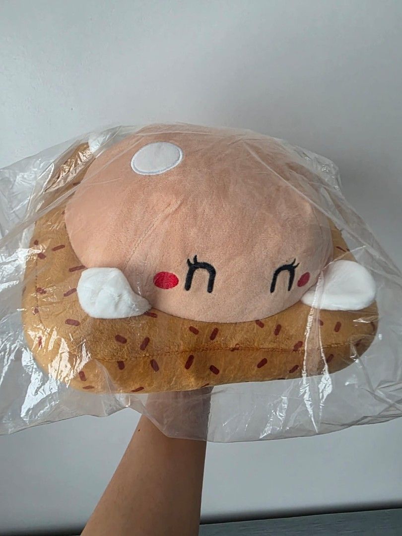 Timezone Sandwich Plushie (Category: Plushies & Soft Toys) located in Manila. Submitted by mapayu (Listing ID 1416443768, Image 1). Description: - Adorable Timezone sandwich plushie! - Sandwich design with a brown bread-like exterior and yellow filling. - Decorated with sprinkles. - Comes in a clear plastic bag..