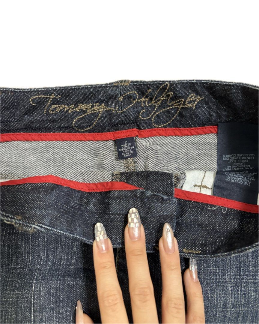 Tommy Hilfiger Denim Skirt (Category: Skirts) located in Manila. Submitted by j_decluttering (Listing ID 1416572363, Image 3). Description: - really nice dark wash in person - can be worn low waisted for size S (i fold it to a shorter length if low waist) - fits XS-M .