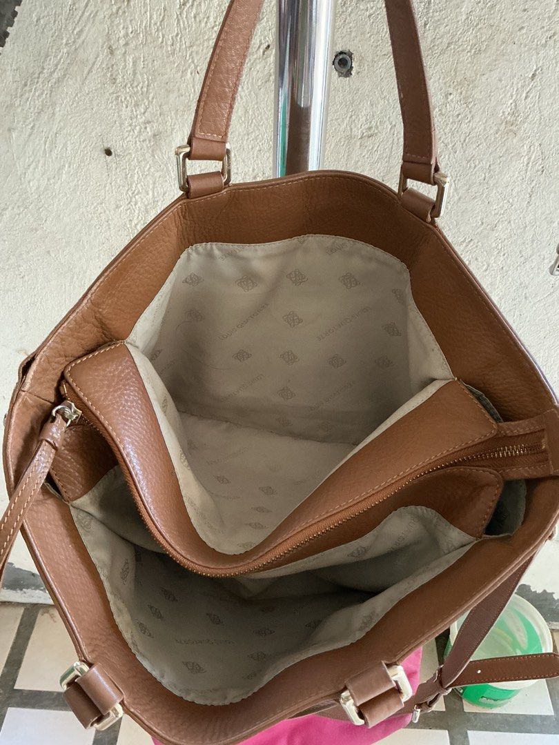 Two-way bag with 3 compartments and pockets inside (Category: Cross-body Bags) located in Santa Maria. Submitted by marvi_declutter (Listing ID 1416600266, Image 2). Description: As sign of used the 4corners on the base of the bag have rubs, but unnotice once using.