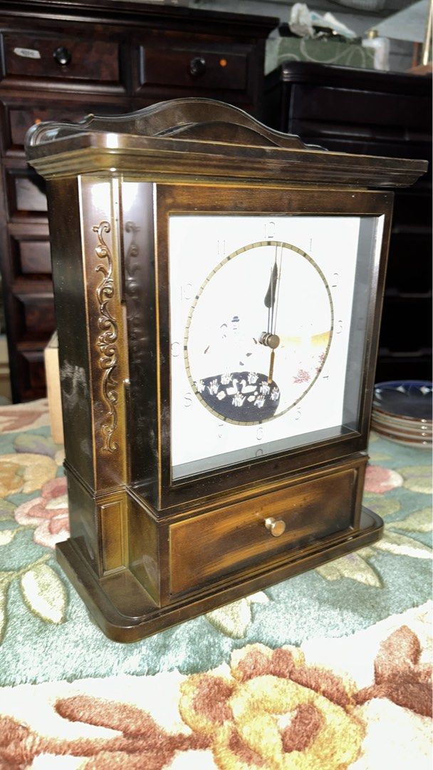 VINTAGE DESIGN DECOR TABLE CLOCK W/ CONCEALED KEY RACK & MELODY TUNE (Category: Clocks) located in Valenzuela. Submitted by gregferraren (Listing ID 1416545390, Image 3). Description: Imported Bento made material Made in Japan With hidden key rack & melody tune upon opening key rack With box & leaflet Sure buyer may inquire video/ charged real time delivery or shipping nationwide upon confirming order thru preferred metrobank/ bdo/ gotyme bank/ m