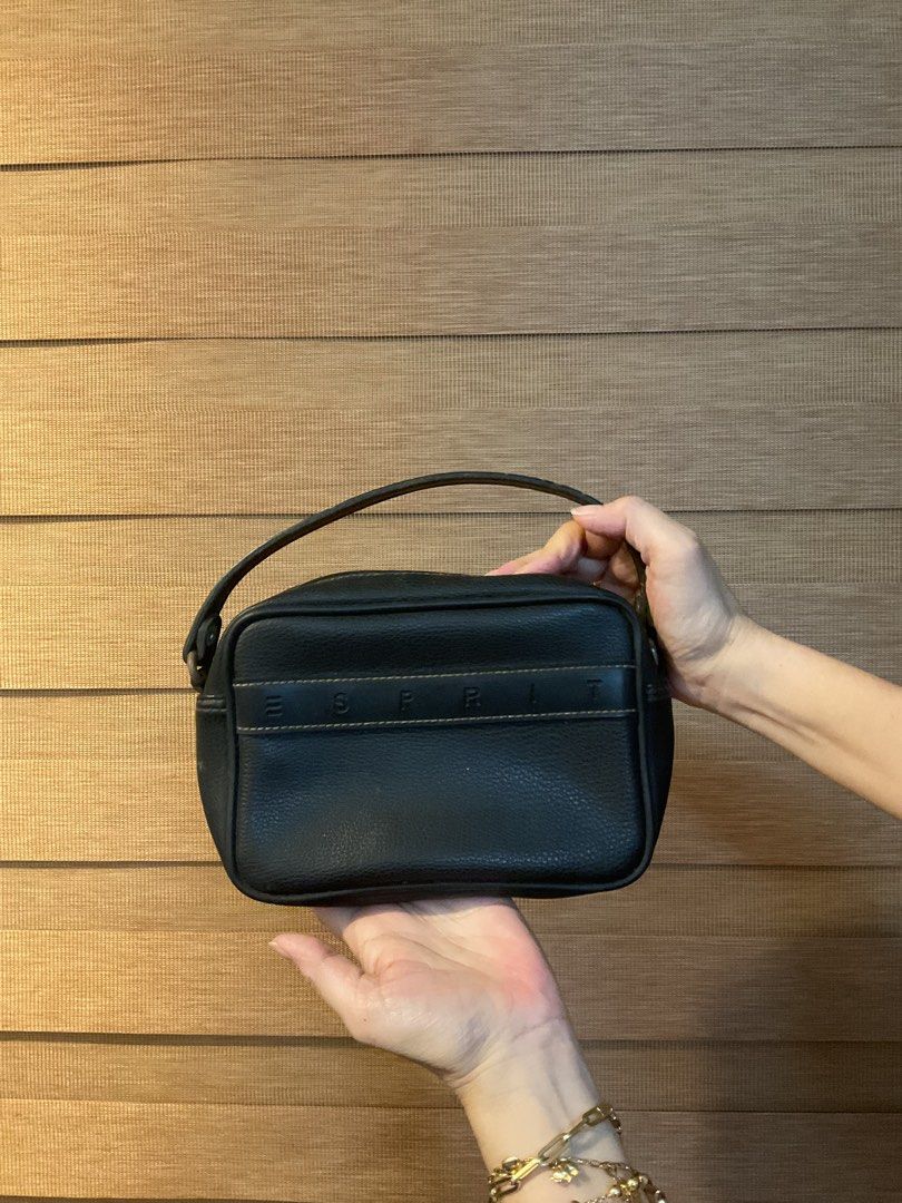 Vintage Esprit Black Handbag (Category: Luxury Bags & Wallets) located in Quezon City. Submitted by japfoodl0ver (Listing ID 1416573155, Image 1). Description: - Black Esprit handbag - Top handle design - Brand name stitched on front - Zipper closure - Contrasting stitching detail - Bought in the US.