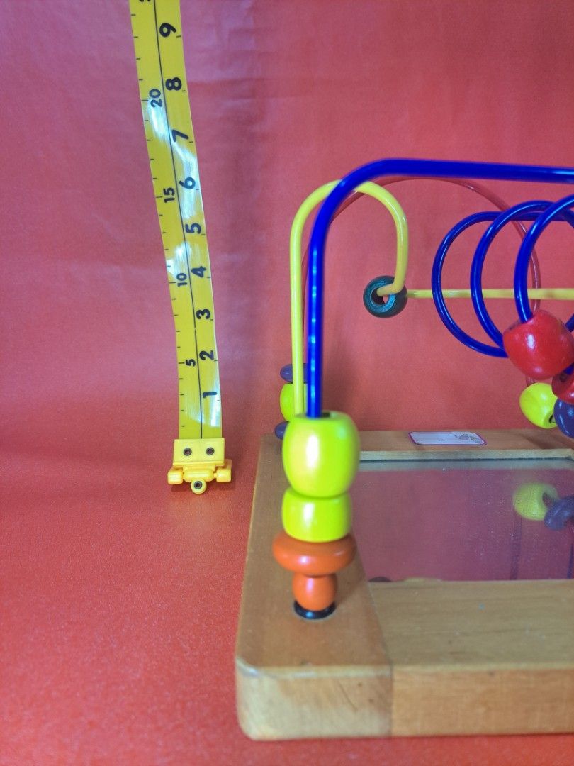 Wooden Bead Maze Activity Cube with Mirror (Category: Infant Playtime) located in Santa Rosa. Submitted by thecoolkidsclub (Listing ID 1416537416, Image 2). Description: Wooden activity cube features a bead maze with colorful beads and wires. It has a mirror on one side and a wooden frame. It is designed to entertain and engage children with its interactive features..
