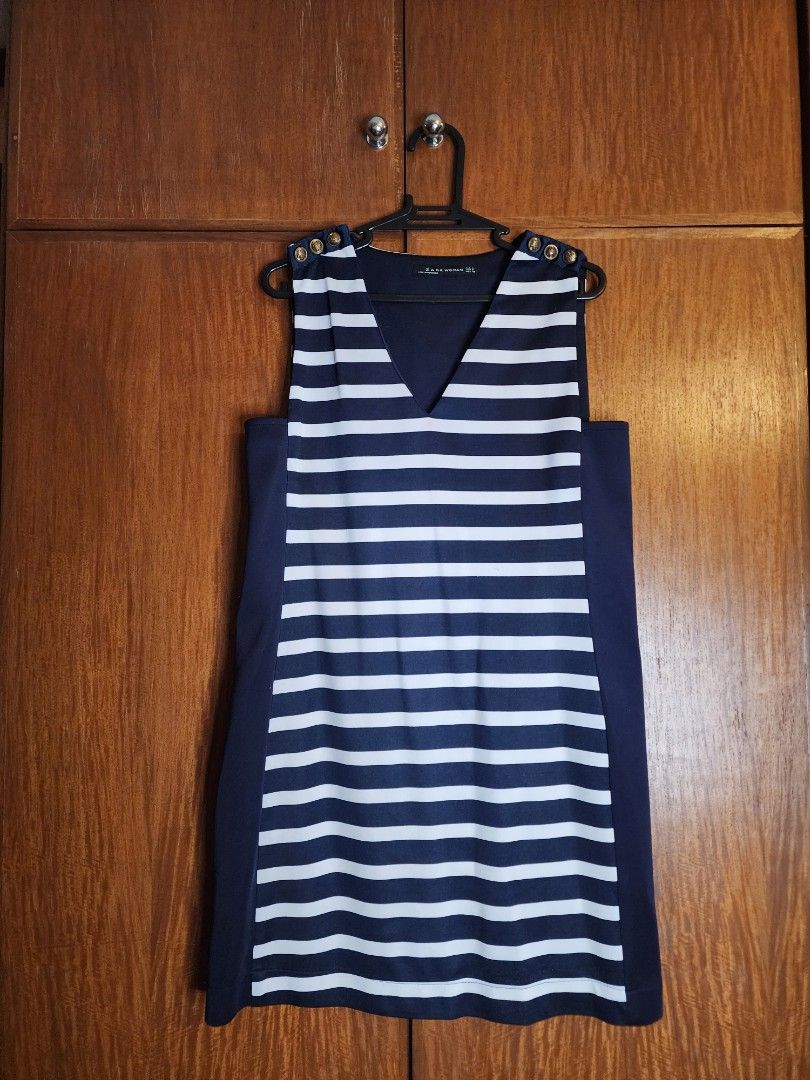 ZARA STRIPED DRESS (Category: Dresses) located in Muntinlupa City. Submitted by trishdlf (Listing ID 1416571950, Image 1). Description: - Zara striped shift dress - Color: Navy blue and white - Button details - V-neck - Size: M Discounts for 3 or more items MOP: BPI/Gcash Shipping thru Gogoxpress c/o buyer .