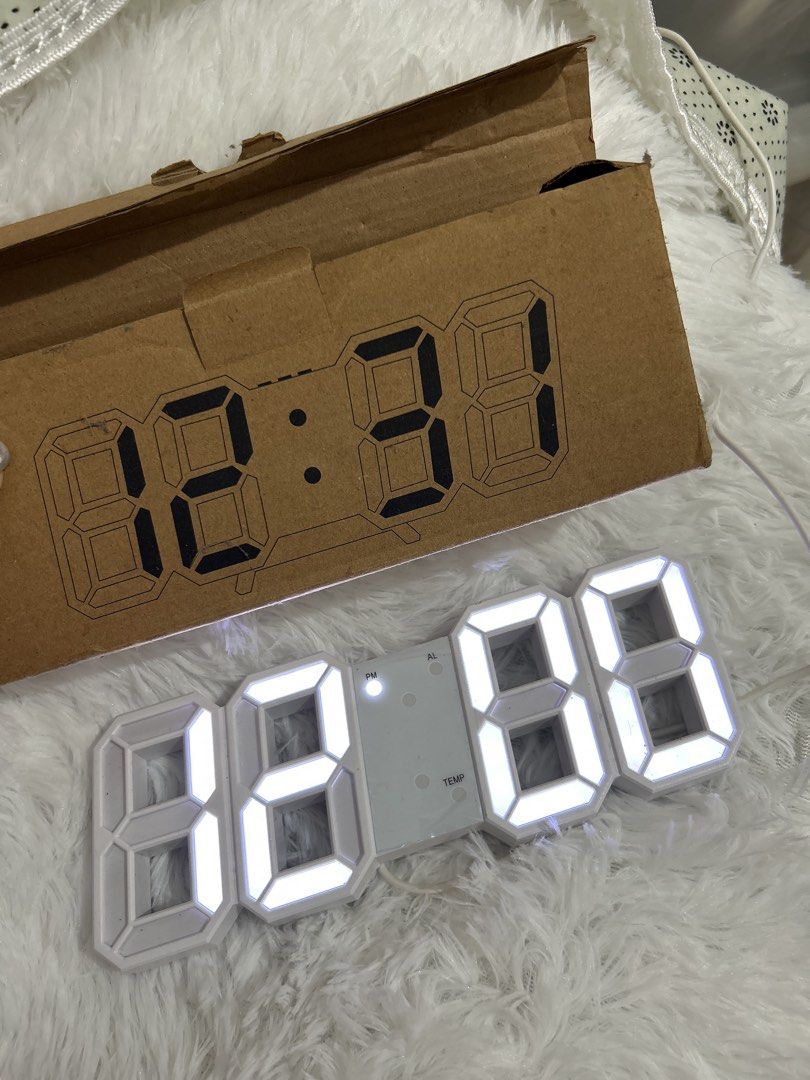 3D LED Digital Clock Aesthetic (Category: Clocks) located in Manila. Submitted by jmlois (Listing ID 1413120053, Image 1). Description: - 3D LED digital clock - White finish - Displays time, alarm, and temperature - Comes in original packaging - Powered by a cable.