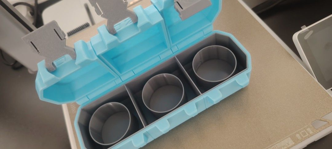Beyblade Case (Category: Storage Boxes & Baskets) located in Quezon City. Submitted by securetechphi (Listing ID 1413183529, Image 2). Description: - 3D-printed storage box - Features three compartments - Available colors: Blue and Pink - Secure closing lid with clasps - Ideal for storing small items - Capacity for Three Beyblades: Securely stores up to three beys of Beyblade X. Suitable for BX, UX, and CX..