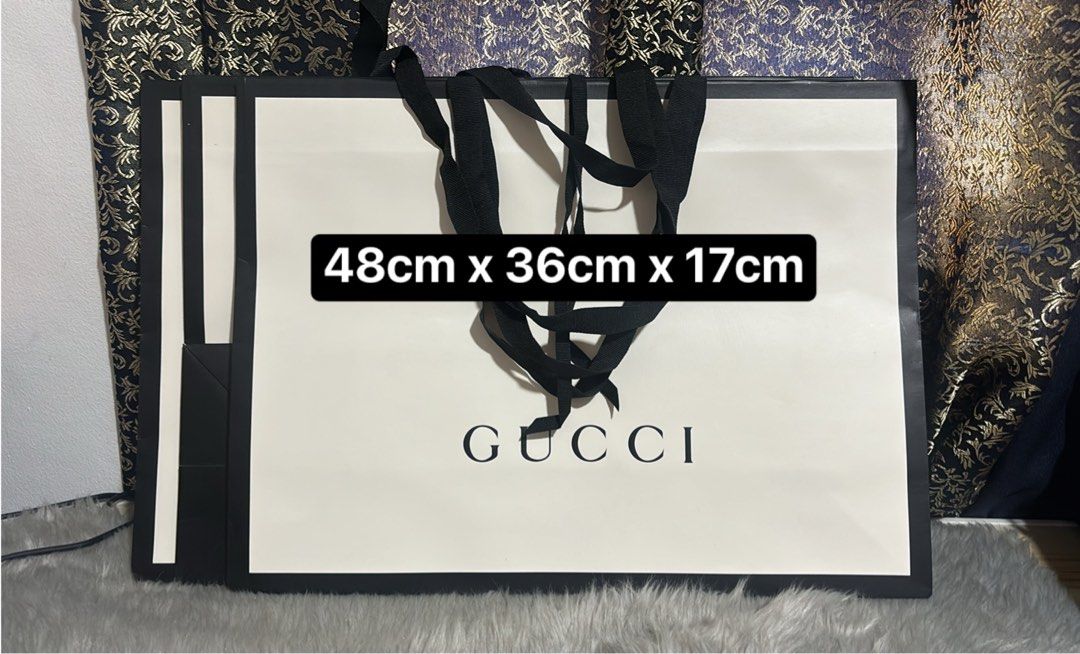 ✅ Authentic Gucci Large Paperbag (Category: Luxury Bags & Wallets) located in Quezon City. Submitted by box.luxebycheng (Listing ID 1413054227, Image 1). Description: Fits Medium to Large Bag.