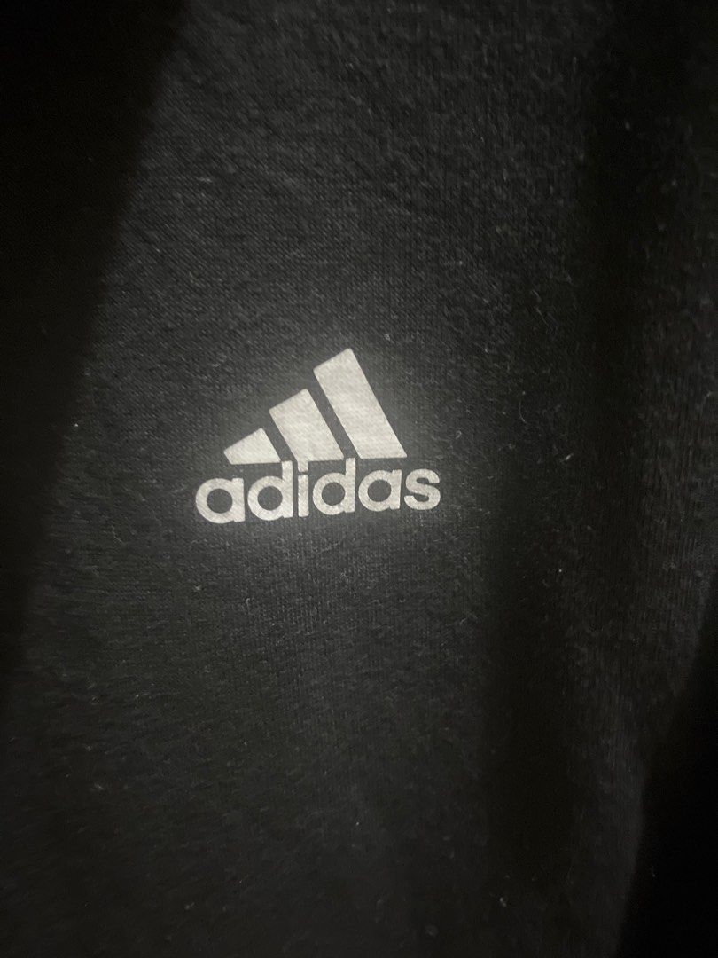 Adidas Hoodie with Stripes (Category: Hoodies) located in Valenzuela. Submitted by gengen13 (Listing ID 1413182248, Image 2). Description: - Black Adidas hoodie - White stripes on sleeves - Adidas logo on chest - Size: A/M 175/96A - Hood and front pocket - Minor mark on sleeve - Tagline: "I am sport. Gameday or any day." Dimes : L 24.5 W 21.5 With marks sa sleeve. Labhan nio nlng po. Color rating 9/10 With signs of usage Preloved item. Pls manage