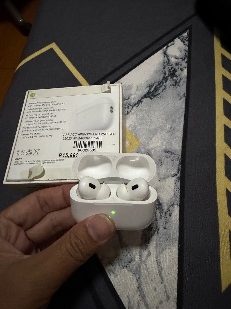Apple AirPods Pro 2nd Gen (Category: Earphones) located in Manila. Submitted by prettyrae (Listing ID 1413130704, Image 3). Description: - Apple AirPods Pro 2nd Gen - Includes MagSafe charging case - Comes with earphones and charging case - Charging case features a light indicator - Color: White - Original price: ₱15,990.