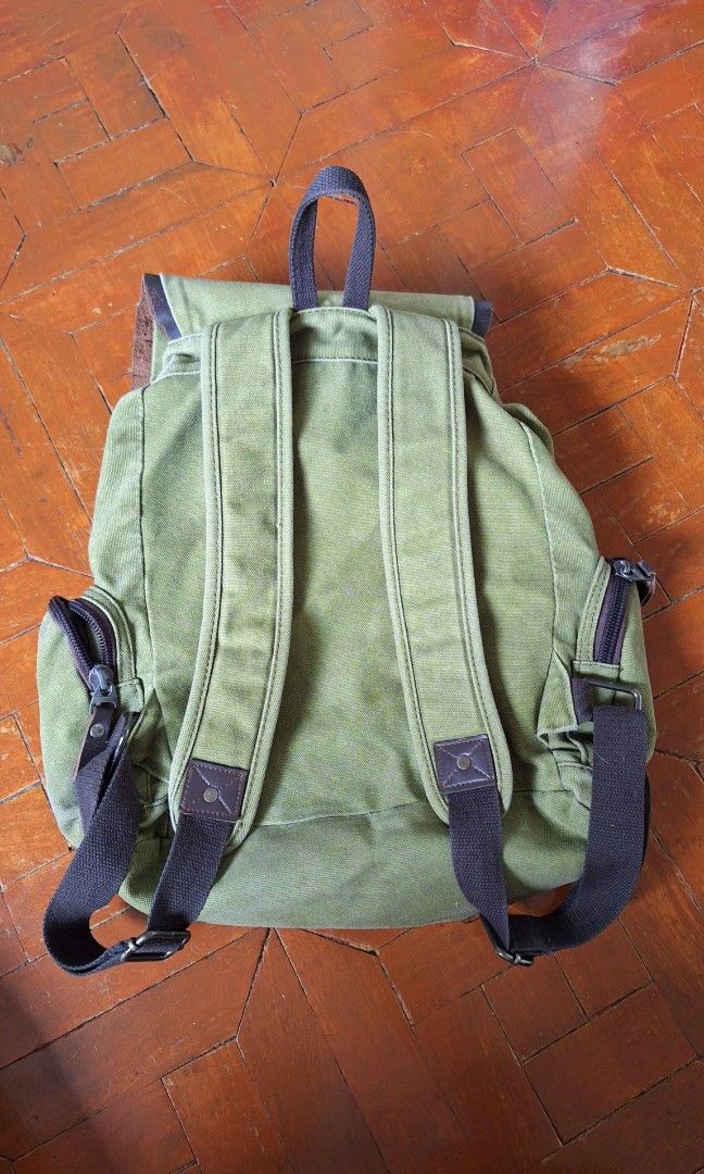Army Green Knapsack / Canvas Backpack (Category: Backpacks) located in Marikina City. Submitted by thesecondroomph (Listing ID 1413040730, Image 3). Description: army green canvas backpack, kinda looks like a herschel knapsack can fit a laptop water resistant.