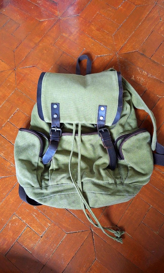Army Green Knapsack / Canvas Backpack (Category: Backpacks) located in Marikina City. Submitted by thesecondroomph (Listing ID 1413040730, Image 1). Description: army green canvas backpack, kinda looks like a herschel knapsack can fit a laptop water resistant.