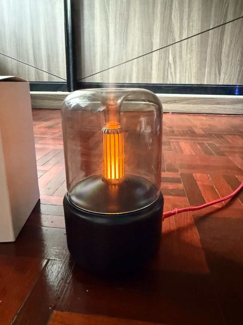 Aromatherapy Diffuser Candlelight (Category: Home Fragrance) located in Kuching. Submitted by teampajamas (Listing ID 1413106501, Image 2). Description: Letting go Aromatherapy Diffuser Candlelight for RM 25 inclusive of shipping Has visible water stains (internal only) but overall functions still intact Suitable for those who prefer gentle/candlelight design Reason to let go: No longer using - Stylish aroma diffuser - Glass cover and warm light 